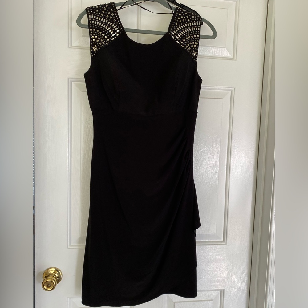 Size 8 stretchy black knee length dress
